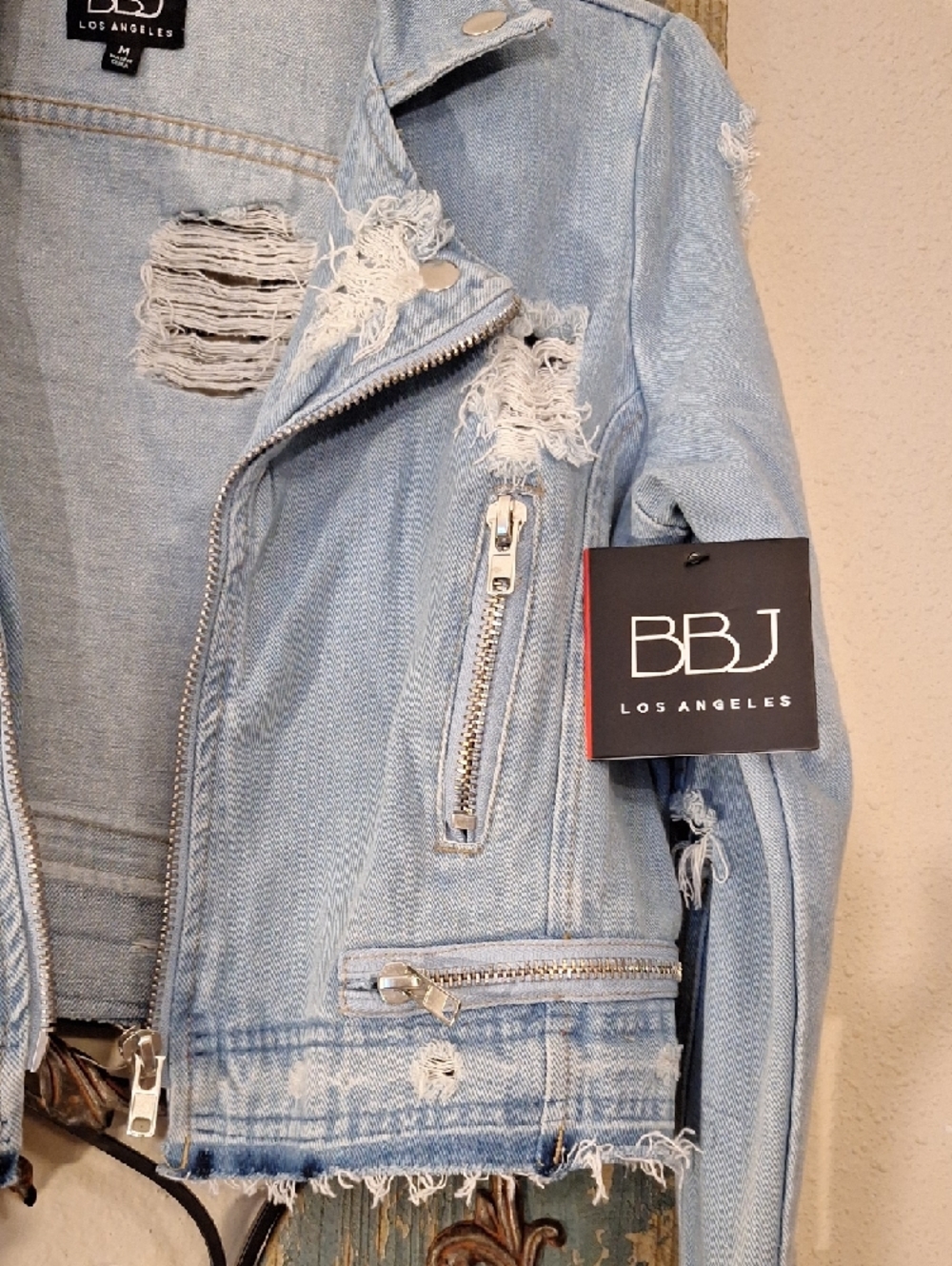 Light Blue Distressed Cropped Denim Jacket with Studded Cuffs. NWT Size Medium - Picture 11 of 16
